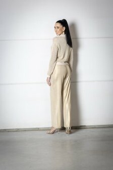 Wijde broek goudkleurig.
